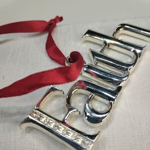 Silver Holiday Ornament with Red Ribbon